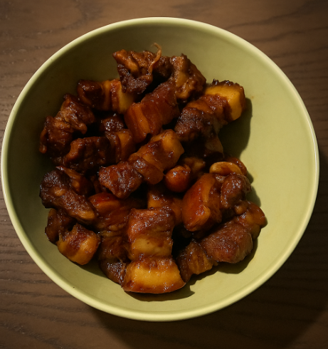 The perfect bite - a caramelised, golden brown bowl of Hong Shao Rou